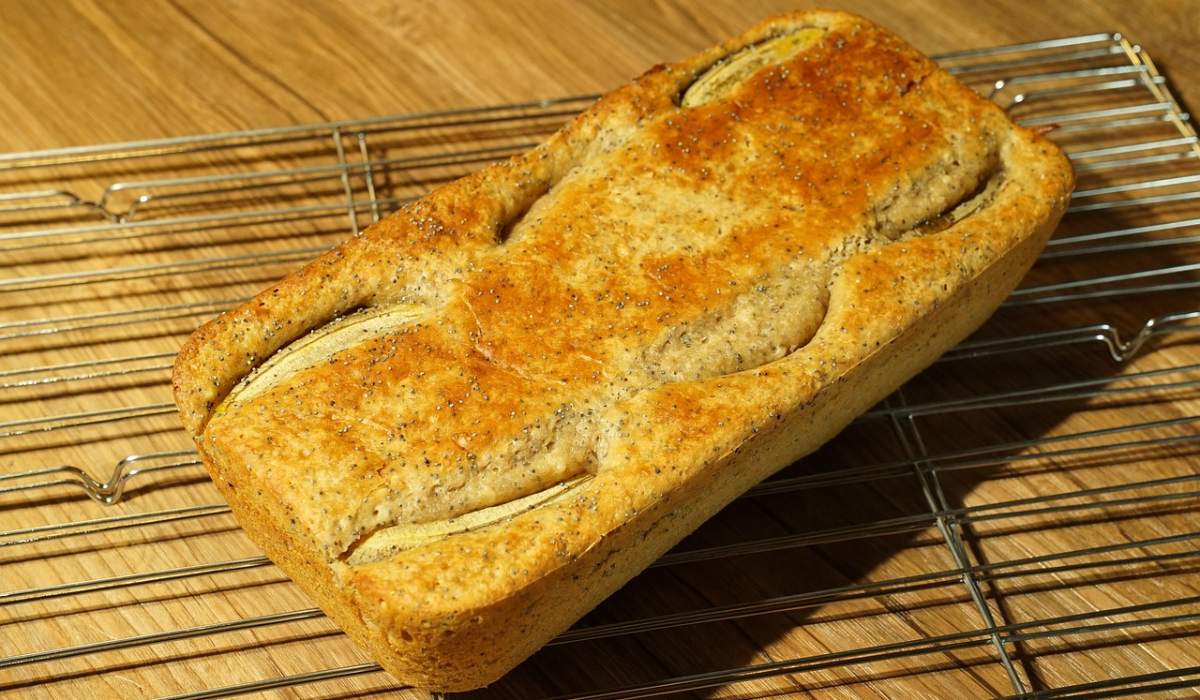 A banana bread on a wooden table.