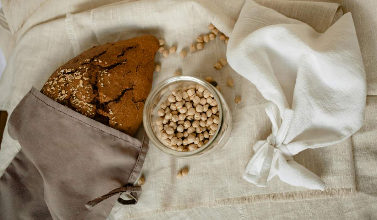 Dark bread in a reusable grey bag