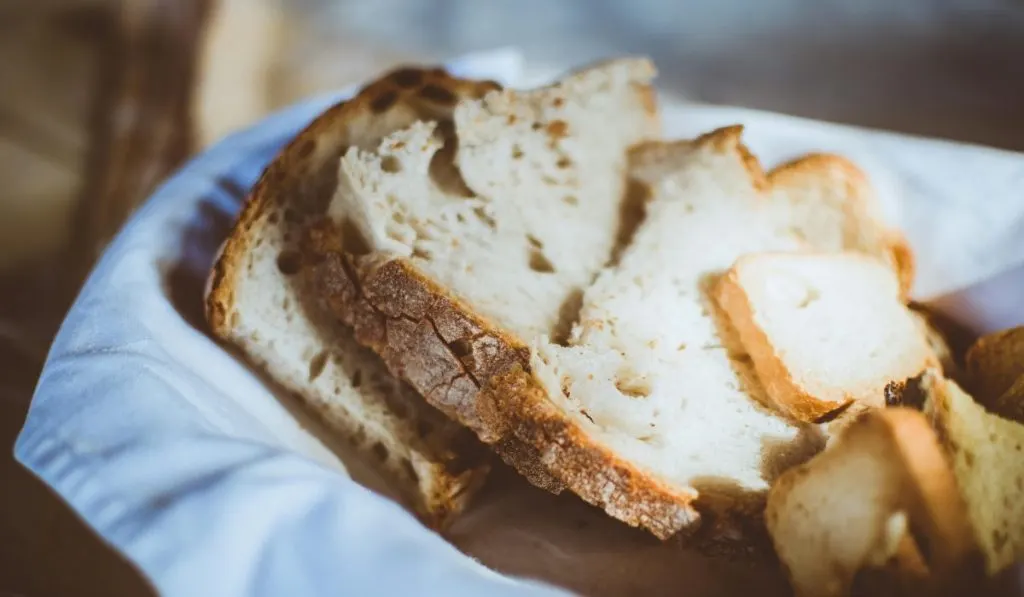 Keto Sourdough Bread slices in the Bowl on the the Blue cloth