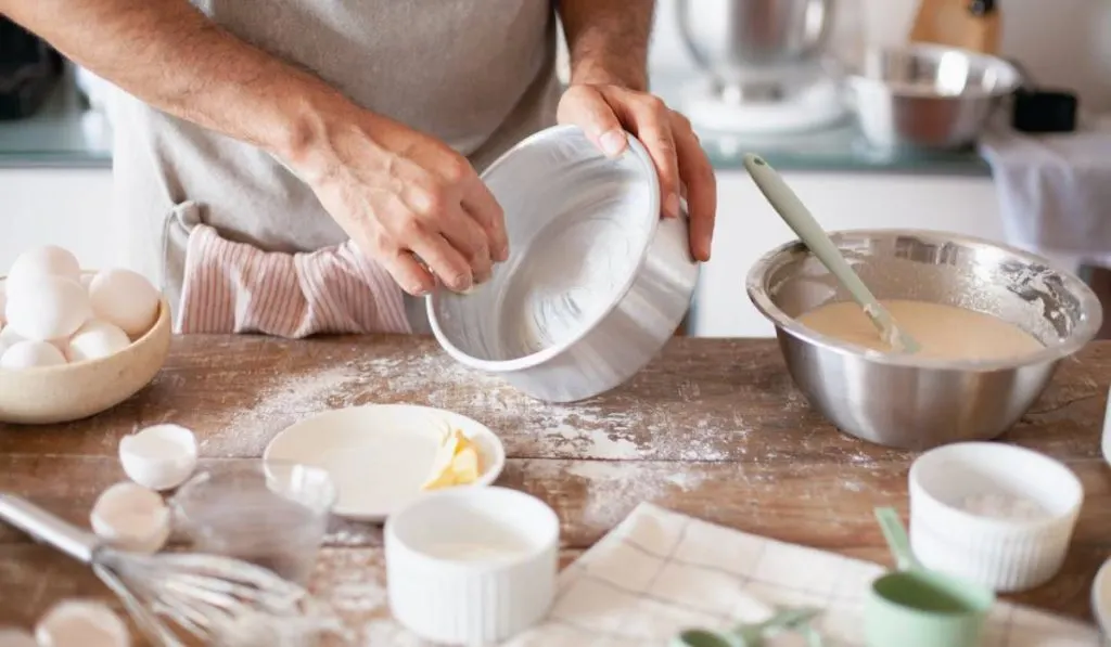 Person preparing sourdough
