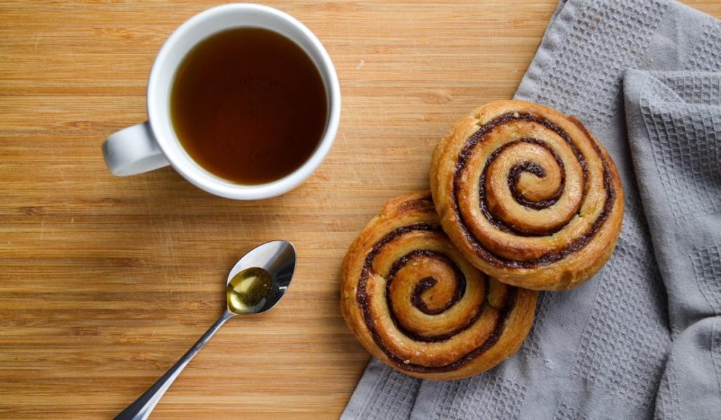 Cup of Tea with cinnamon rolls